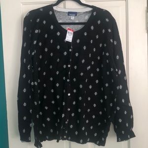 Black sweater with white design